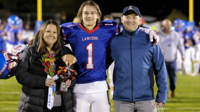 Ryan Stebbins celebrates Senior Night with his family.