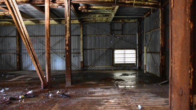 The inside of the tower was wet, empty, and falling apart.