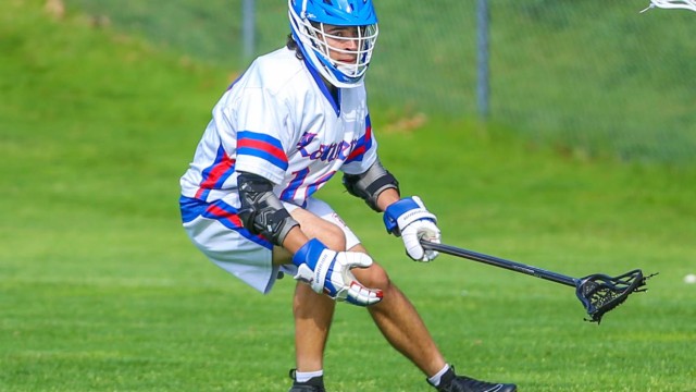 Junior Dylan Wrisley plays defense against Souhegan.